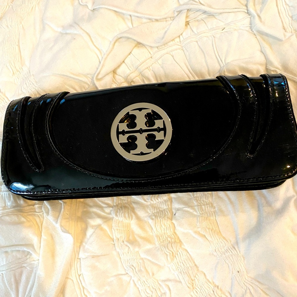 Tory Burch genuine patent leather clutch perfect for a night out.